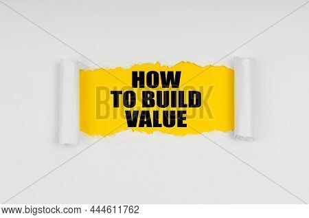 Business And Finance Concept. A Window Is Made In The Paper, Where On A Yellow Background The Inscri