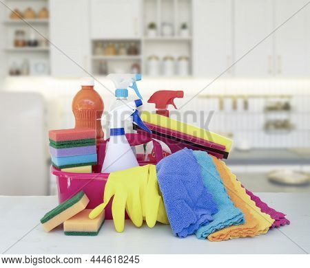 Cleaning Supplies Tools On Spring Tree Bloom Over Kitchen Background, Spring Clean Concept