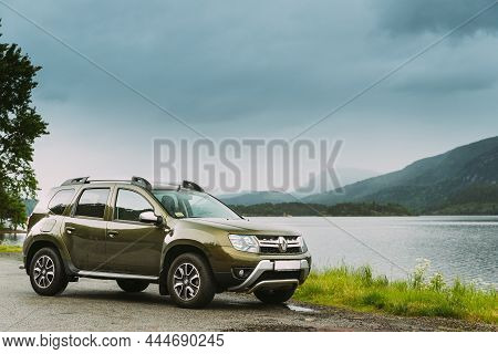 Kroderen, Norway - June 12, 2019: Car Renault Duster Suv Parked Near Lake Kroderen In Norwegian Coun