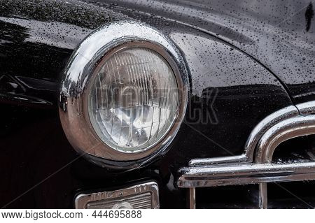 Nizhny Novgorod, Russia - June 15, 2020: Classic Soviet Car Exhibition. Close Up: Round Headlight Of
