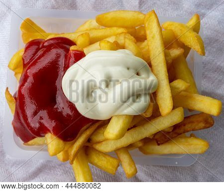 French Fried Potato Sticks With Tomato Ketchup And Egg Mayonnaise Ready To Eat