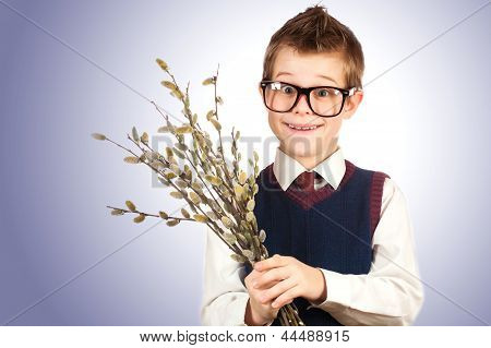 cute boy in a hurry for a date with a bunch of willow