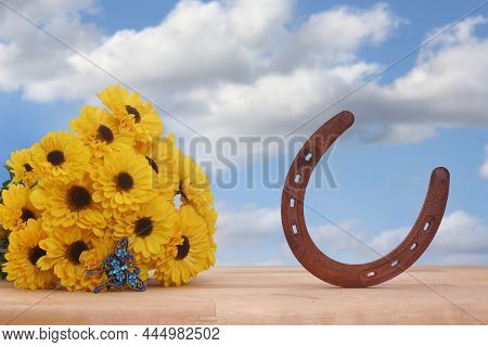 Yellow Flowers And Butterfly Jewelry With Blue Sky And Clouds