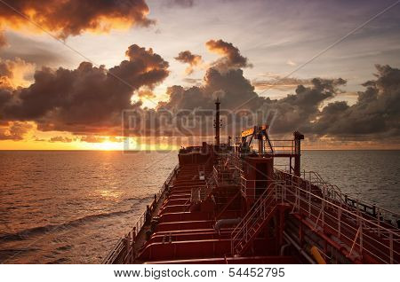 product tanker voyage at sunset
