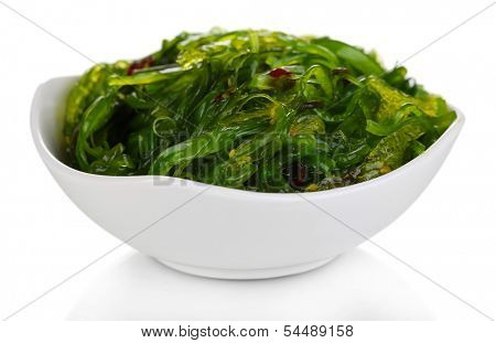 Sea kale in bowl close-up isolated on white