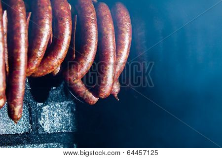 Traditional Food. Smoked Sausuages In Smokehouse.