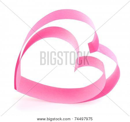 Heart shaped pink paper ribbon isolated on white