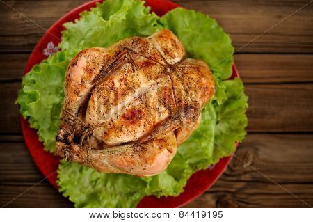 Bondage Shibari Roasted Chicken With Salad Leaves On Red Plate On Wooden Background Top View Horizon