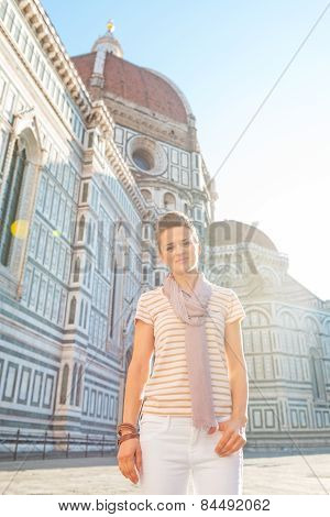 Portrait Of Happy Young Woman In Front Of Cattedrale Di Santa Ma
