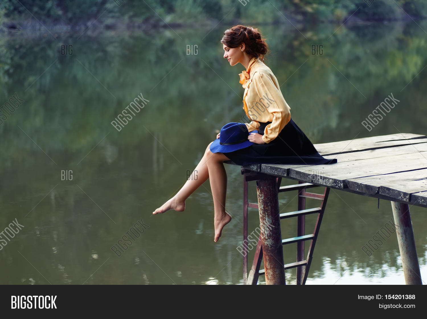 Side View Dreaming Girl Sitting On Image And Photo Bigstock 7971