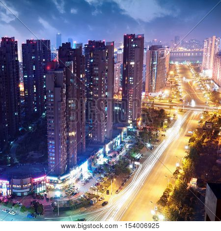 Modern architecture of the city and viaduct night view.