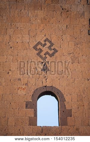 Swastika mark on a wall in Ani Turkey. Ani used to be the capital of the Bagratid Armenian kingdom between 961 and 1045.