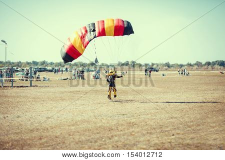 Parachute jumper on a wing parachute execute a controlled descent by parachute