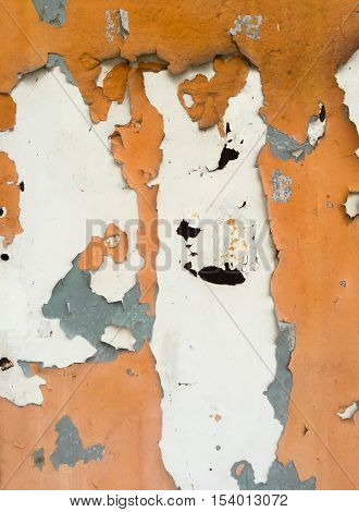 grungy wall texture with peeling paint and close upshot