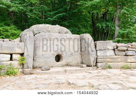 Dolmen single-chamber megalithic tomb of the Middle Bronze Age (3000-2000 BC). Valley of Zhane River near the village Vozrozhdenie in the vicinity of the resort city of Gelendzhik. Western Caucasus Krasnodar region of Russia.