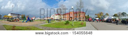 SENNO BELARUS - OCTOBER 8 2016: Panoramic view of central town square Senno Vitebsk region Belarus. Unidentified people walk outdoors during event Dozhinki-2016