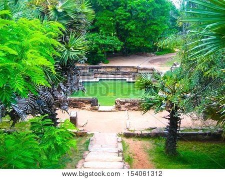 The pond at Polonnaruwa temple - medieval capital of Ceylon or Sri Lanka Asia UNESCO