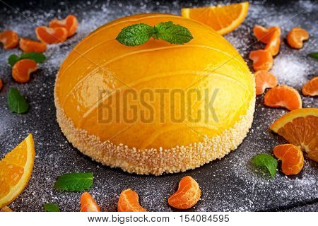 Cake witch Orange mousse, Mandarin saucea and fruit.