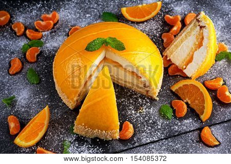 Cake witch Orange mousse, Mandarin saucea and fruit.