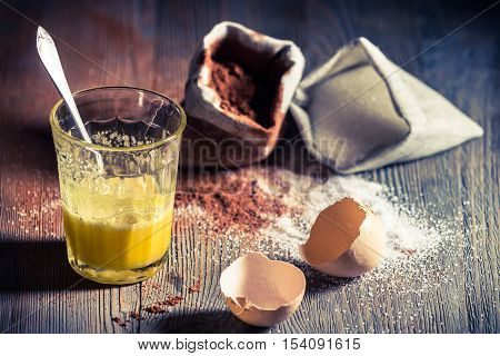 Ingredients for a simple dessert on old wooden table