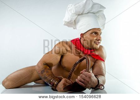 beautiful cook naked man on a white background