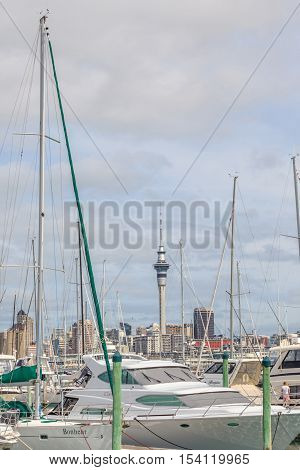 Auckland New Zealand- December 10 2013. Auckland city and sky tower view from the Westhaven Marina.