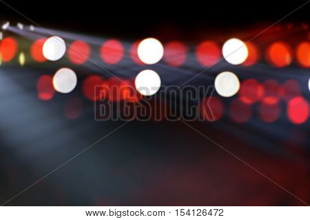 Stage lights on concert. Lighting equipment with multi-colored beams. abstract background.