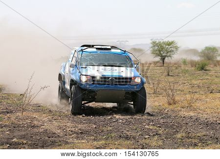 Front View Close-up Of Racing Blue And White Vw Amarok Twin Cab Rally Car