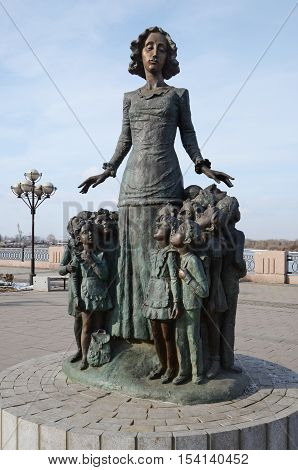 Irkutsk, Russia - Oct 27, 2016: Monument To The Teacher, Surrounded By Children