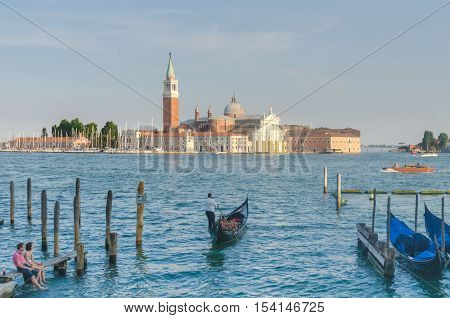 VENICE ITALY - JUN 11 2014: Venice a city in northeastern italy. It is famous for the beauty of its settings archtecture and artwork. A part of Venice is resignated as a World Heritage site.