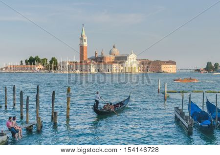 VENICE ITALY - JUN 11 2014: Venice a city in northeastern italy. It is famous for the beauty of its settings archtecture and artwork. A part of Venice is resignated as a World Heritage site.