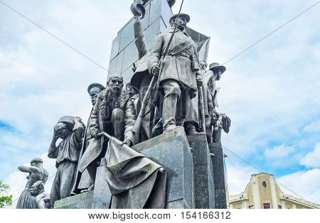 KHARKOV UKRAINE - MAY 20 2016: The statues of participants of the Russian Revolution at the Taras Shevchenko Monument on May 20 in Kharkov.