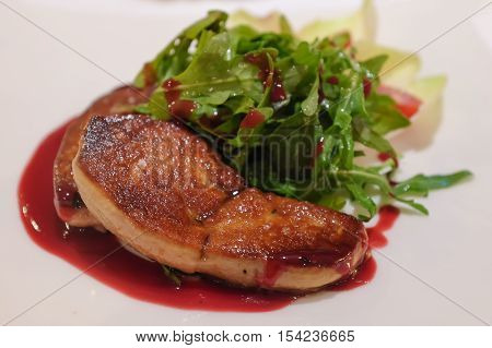 Grilled foie gras steak with green salad
