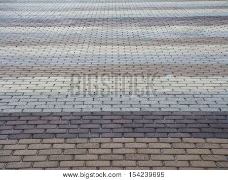 Gradient grey and brown brick floor for background and texture