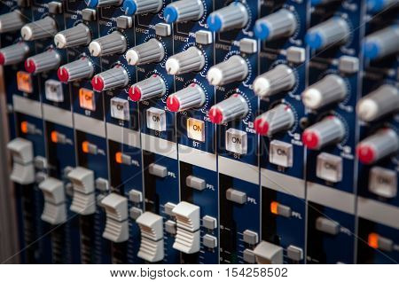 mixer panel switch ON, close-up of audio controls