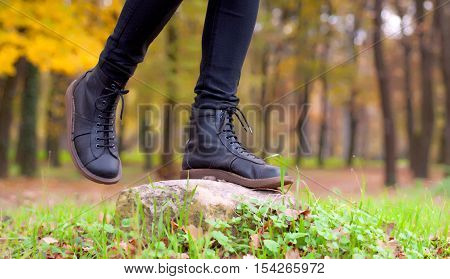 A pair of Leather Boots in the forest