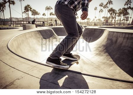 Skater boy practicing at the skate park