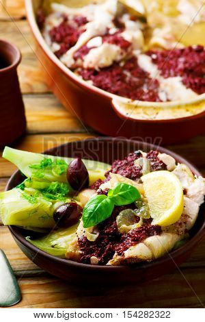 Cod with Olives and Fennel rustic style..seletive focus