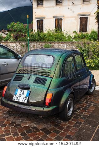 POLCENIGO ITALY - MAY 15: View of yellow Fiat Cinquecento retro Italian car on May 15 2016
