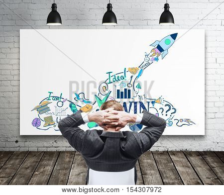Back view of relaxing businessman looking at whiteboard with creative start up sketch in interior with brick wall ceiling lamps and wooden floor. Successful startup concept. 3D Rendering