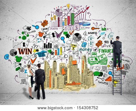 Businesspeople on ladder looking at creative business sketch on concrete wall. Success concept