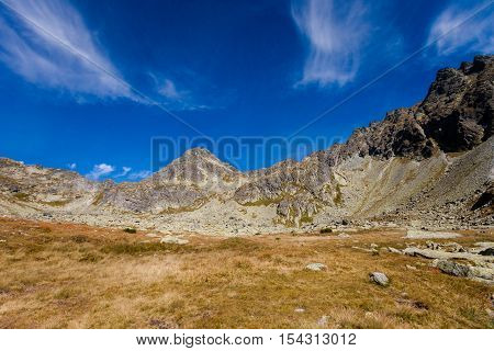 Beautiful Mlynicka dolina on the way to Bystre sedlo - in slovakian high Tatra mountains. Summer panorama with great weather and blue sky
