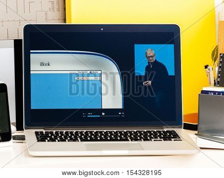PARIS FRANCE - OCT 28 2016: Apple Computers website on new MacBook Pro Retina with OLED Touch bar in geek creative room showcasing Apple Keynote history of iBook laptop computer