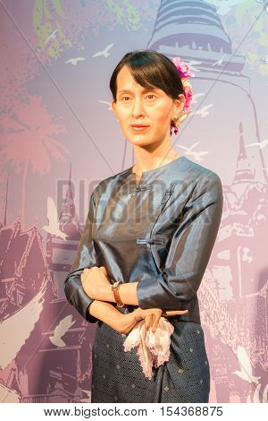 BANGKOK THAILAND - DECEMBER 19: Wax figure of the famous Aung San Suu Kyi from Madame Tussauds on December 19 2015 in Bangkok Thailand