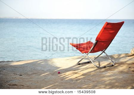 En la playa, silla de descanso