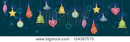 Background with colorful Christmas decorations on the background of snowflakes