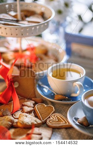 Tea with cookies for breakfast composition in the restaurant
