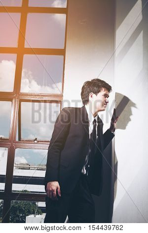Portrait Of A Smiling Young Handsome Businessman