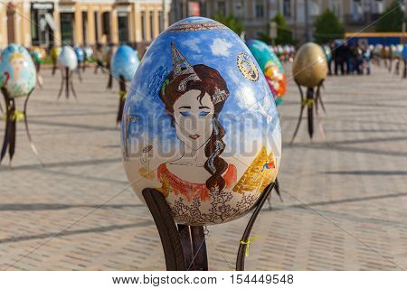 Kyiv Ukraine Sophia Square 2 of May 2016. Pysanky festival. A great image of a woman on the big painted egg on the Pysanky festival close up.