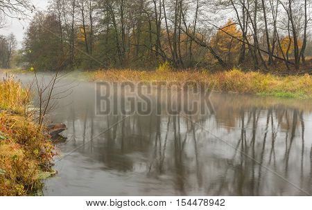 Mist over Vorskla river at autumnal season in Sumskaya oblast Ukraine